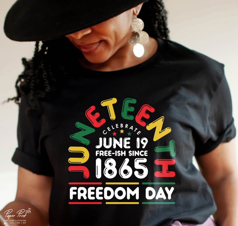 May include: A black t-shirt with a colorful graphic design that says "Juneteenth Celebrate June 19 Free-ish Since 1865 Freedom Day".