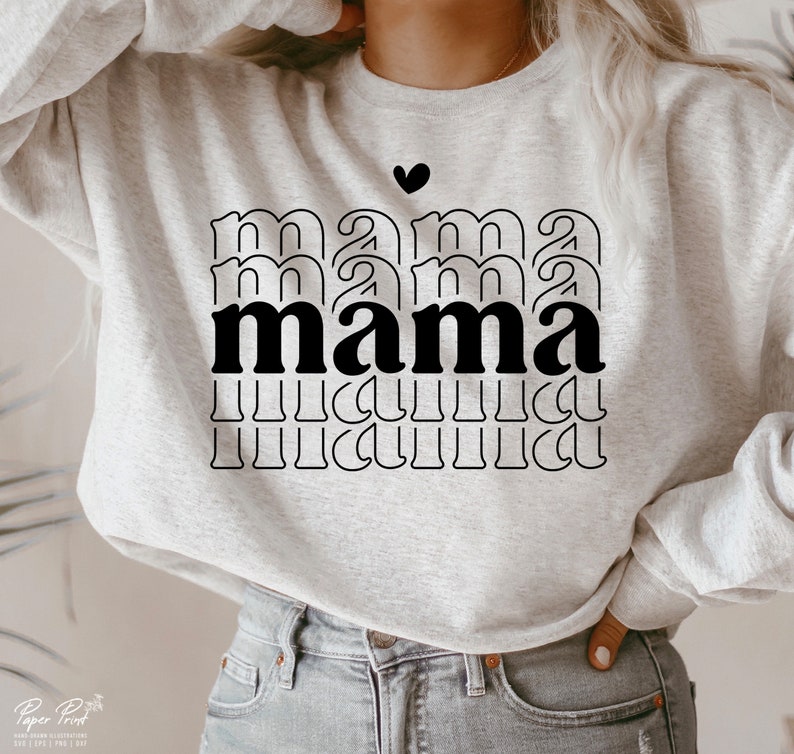 May include: A gray sweatshirt with the word "mama" printed in black letters. The word is repeated multiple times, with each repetition getting smaller. A small black heart is above the word.