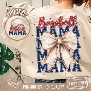 May include: A beige sweatshirt with a pocket on the left side. The sweatshirt has a baseball design with a bow and the text "Baseball Mama" repeated three times in blue and red letters.