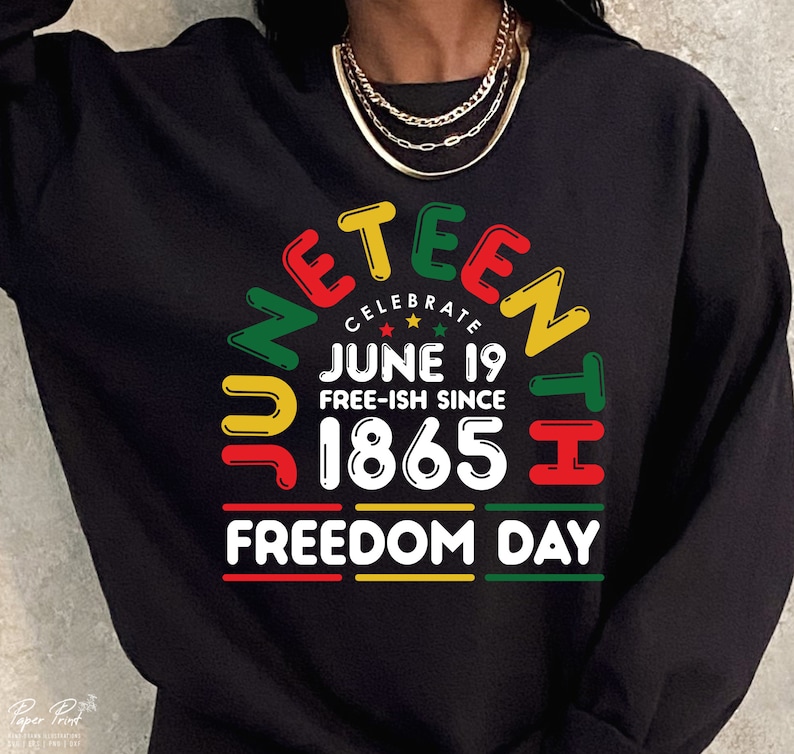 May include: Black sweatshirt with a colorful graphic design that says "Juneteenth Celebrate June 19 Free-ish Since 1865 Freedom Day".