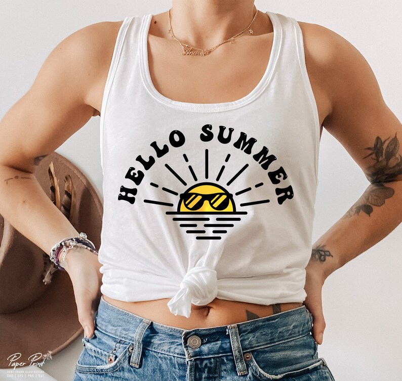 May include: White tank top with a black graphic of a sun wearing sunglasses and the text "Hello Summer".