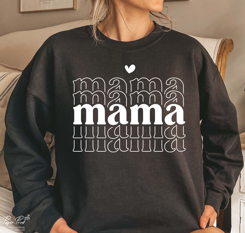 May include: Black sweatshirt with a white graphic design that says "mama" in a retro style with a small heart above the word.