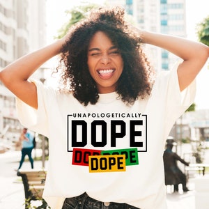 May include: A white t-shirt with the text "Unapologetically Dope" in black letters. The word "Dope" is repeated three times in smaller boxes with red, green, and yellow accents.