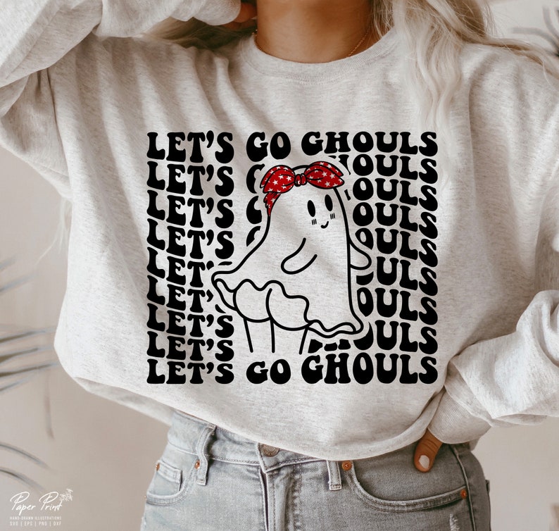 May include: A grey sweatshirt featuring a black and white graphic of a ghost wearing a red bandana. The text "Let's Go Ghouls" is repeated in a retro font.