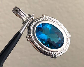 Vintage 925 Sterling Silver and Oval Faceted Dark Blue Glass Pendant