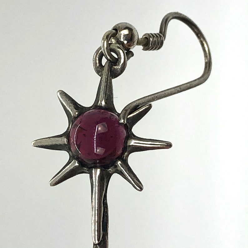 Rare Sterling Silver Female Silhouette Holding or Reaching a Purple Garnet SunStar