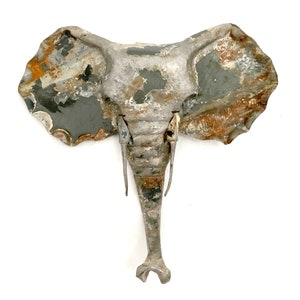 Elephant metal mask, african animal head, unique art, wall hanging, made from recycle car panels by Zenzele artist Mukhanka, Zimbabwe.