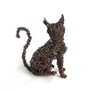 Cat sculpture, wire art, modern art, street art, upcycle, feline, African art, handmade from recycled wire by Zimbabwean artist Mwazha.