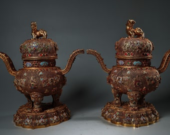 A pair of Chinese pure handmade statues from the Qing Dynasty inlaid with cloisonné incense burners, exquisite and worth collecting