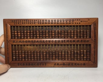 Ancient Chinese natural black sandalwood abacus statues are handmade by the ancients, which are well preserved, precious and rare