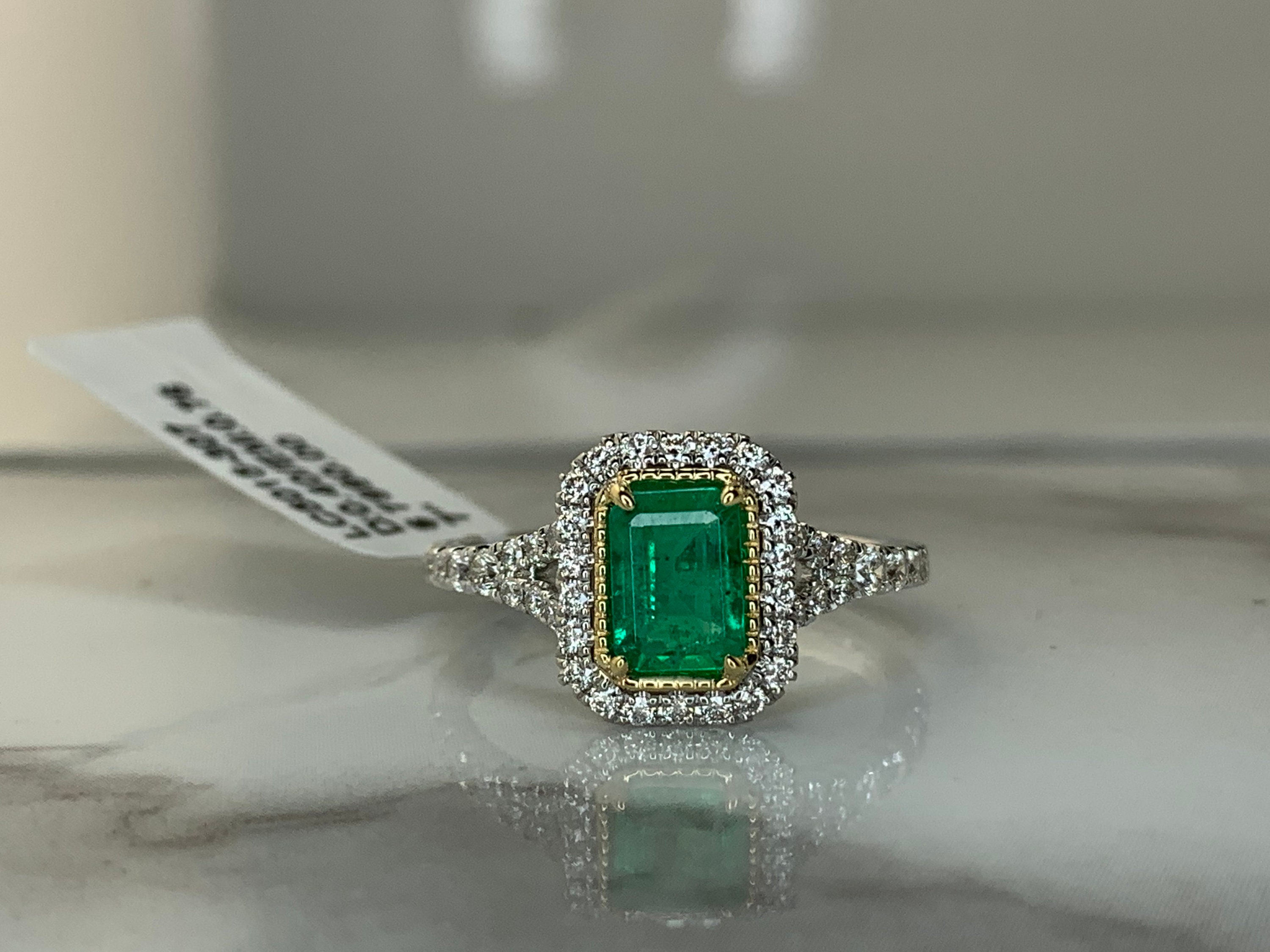 Estate Platinum .76ct Emerald and Diamond Ring