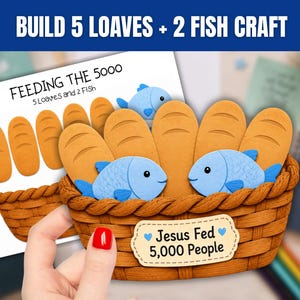 May include: A paper craft kit featuring a brown woven basket filled with five tan bread loaves and two light blue fish. A label on the basket reads "Jesus Fed 5,000 People" with blue hearts. The background sheet shows "FEEDING THE 5000".