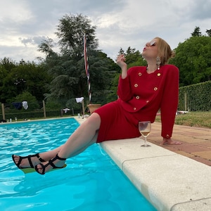 Vintage 2 piece skirt suit in red wool blend from Lucia, size 8-10