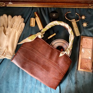Vintage leather handbag in brown