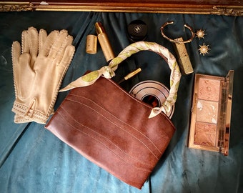 Vintage leather handbag in brown