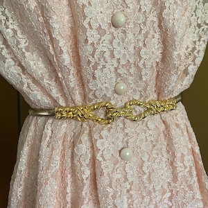 Vintage metal belt in gold, size S