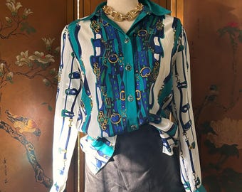 Vintage blouse met all-over paardensportprint in groen en wit van Lucia, maat 6