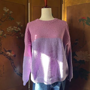 Knitted sweater in pink and purple, size L