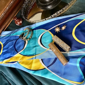 Vintage silk scarf with blue and yellow graphic patterns