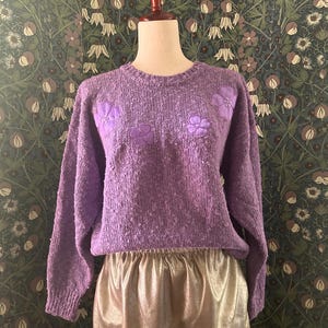 Knitted bouclé jumper with flowers, sequins and beads in purple, size 12