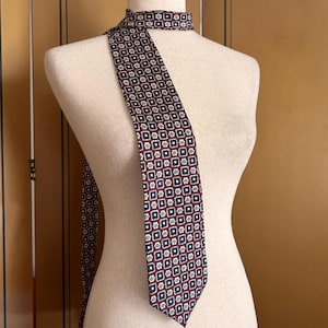 Vintage silk necktie by Oscar de la Renta