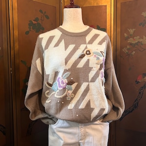 Beige jumper with knitted flowers and beads, size M