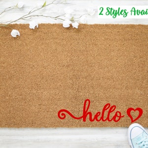 May include: A brown coir doormat with the word "hello" and a red heart written in red cursive.