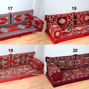 May include: Four red and green patterned floor cushions with matching pillows. The cushions are arranged in two rows of two. Each cushion has a number, 17, 18, 19, and 20, printed above it.