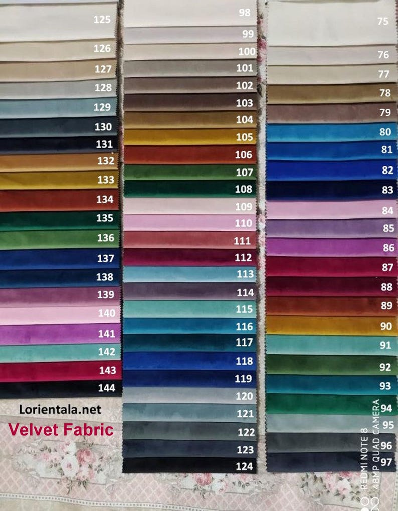 May include: A colour chart of velvet fabric swatches in a variety of shades, including beige, brown, green, blue, and purple. The swatches are numbered and labelled with the text "Velvet Fabric" and the website address "Lorientala.net".