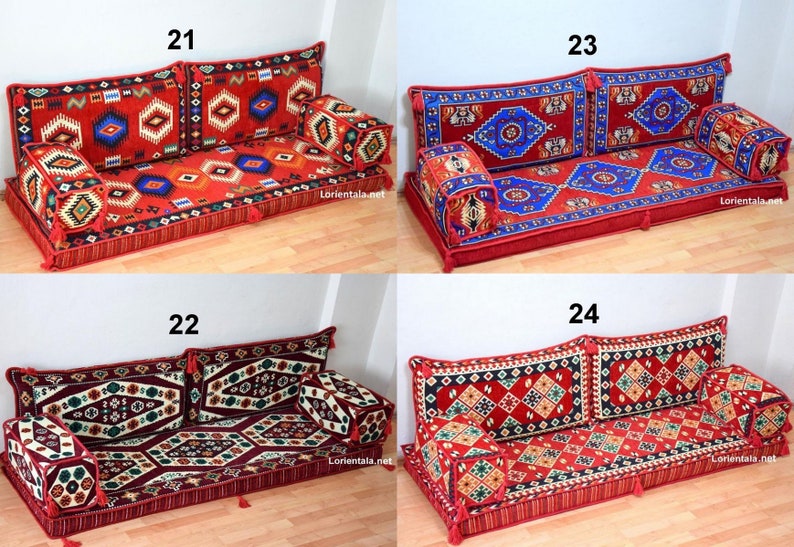 May include: Four different styles of floor cushions with intricate patterns in red, blue, and green. Each cushion is made up of two large back cushions and a smaller front cushion. The cushions are labeled with numbers 21, 22, 23, and 24.