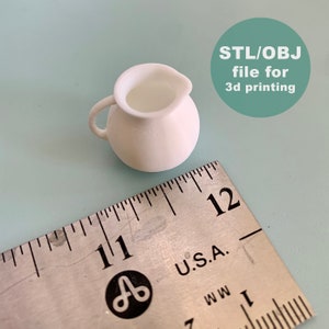 May include: White ceramic pitcher, approximately 5 cm tall, next to a ruler marked in centimetres. STL/OBJ file for 3d printing.