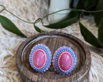 Pink blue and purple resin cab bead embroidered earrings