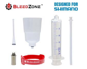 Puede incluir: Un kit de purga de frenos de bicicleta para frenos Shimano. El kit incluye una jeringa, un embudo, un bloque de purga, una manguera y una correa. La jeringa tiene marcas en mililitros. El kit está diseñado para frenos Shimano.