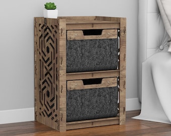 May include: A wooden nightstand with two drawers, each with a gray fabric liner. The nightstand has a geometric pattern carved into the front. A small potted plant sits on top of the nightstand.