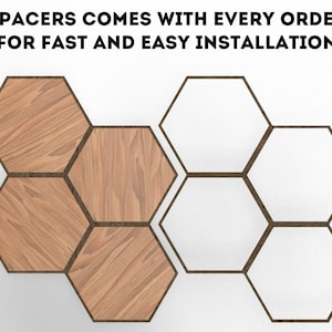 May include: A set of six hexagonal wooden wall tiles with a wood grain pattern. The tiles are arranged in a honeycomb pattern. The tiles are surrounded by a white background. "SPACERS COMES WITH EVERY ORDER FOR FAST AND EASY INSTALLATION" is written in black text at the top of the image.