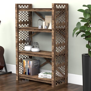 May include: A four-shelf wooden bookcase with a honeycomb pattern on the sides. The shelves are filled with books, decorative objects, and plants. The bookcase is made of dark brown wood and has a rustic look.