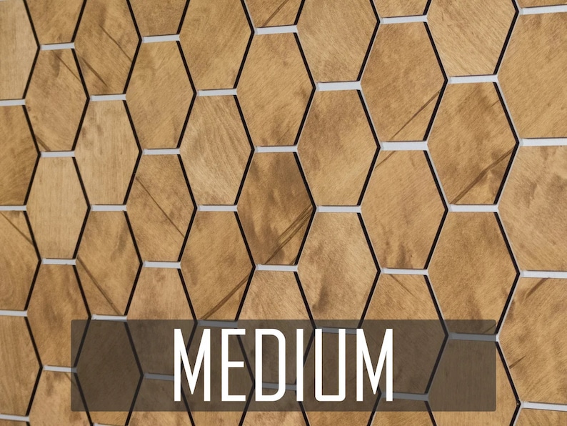 May include: A wall covered in brown hexagonal tiles with black and white borders. The word "MEDIUM" is printed in white on a brown rectangle at the bottom of the image.