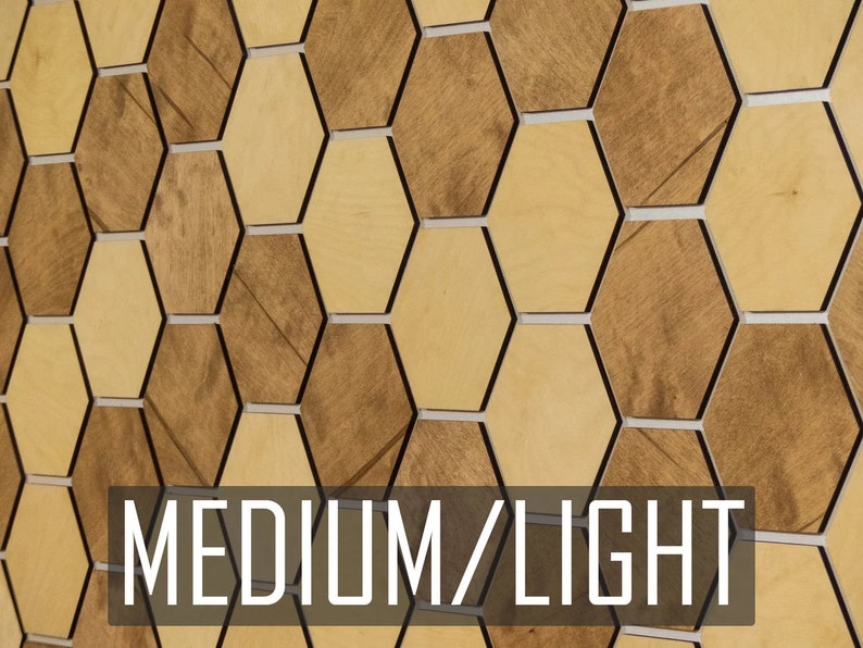 May include: A wall covered in a honeycomb pattern of wood tiles. The tiles are a medium brown color with a light wood grain. The text "MEDIUM/LIGHT" is printed at the bottom of the image.