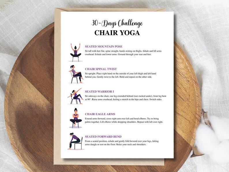 May include: A white paper with the text "30-Days Challenge Chair Yoga" and illustrations of yoga poses. The poses include Seated Mountain Pose, Chair Spinal Twist, Seated Warrior I, Chair Eagle Arms, and Seated Forward Bend. The paper is on a wooden surface.