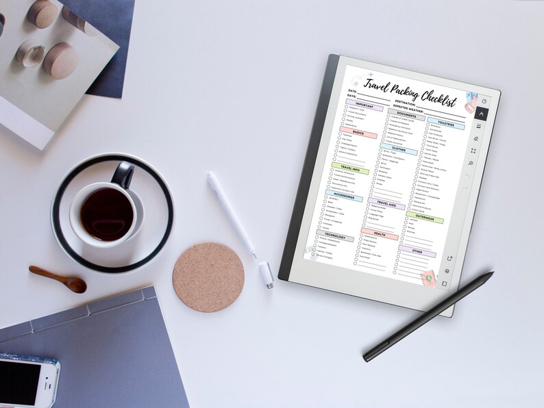 May include: A digital tablet with a white background and a checklist titled "Travel Packing Checklist" with categories for documents, electronics, toiletries, clothing, shoes, accessories, health and first aid, and other items. The checklist is on a white background with a black stylus next to it.