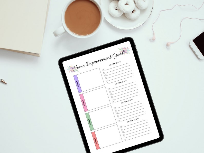 May include: A digital tablet with a checklist for home improvement goals. The checklist has four sections for goals and action steps. The tablet is on a white surface with a cup of coffee and a plate of donuts.
