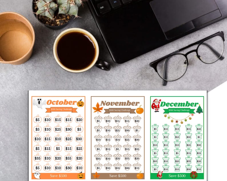 May include: Three printable charts for a $300 savings challenge. The charts are themed for October, November, and December with Halloween, Thanksgiving, and Christmas icons. Each chart has a grid of 25 squares with dollar amounts to save each day.