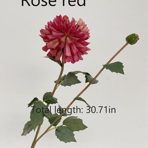 May include: A single artificial rose red dahlia flower stem with green leaves. The stem is approximately 30.71 inches long.  Rose red.