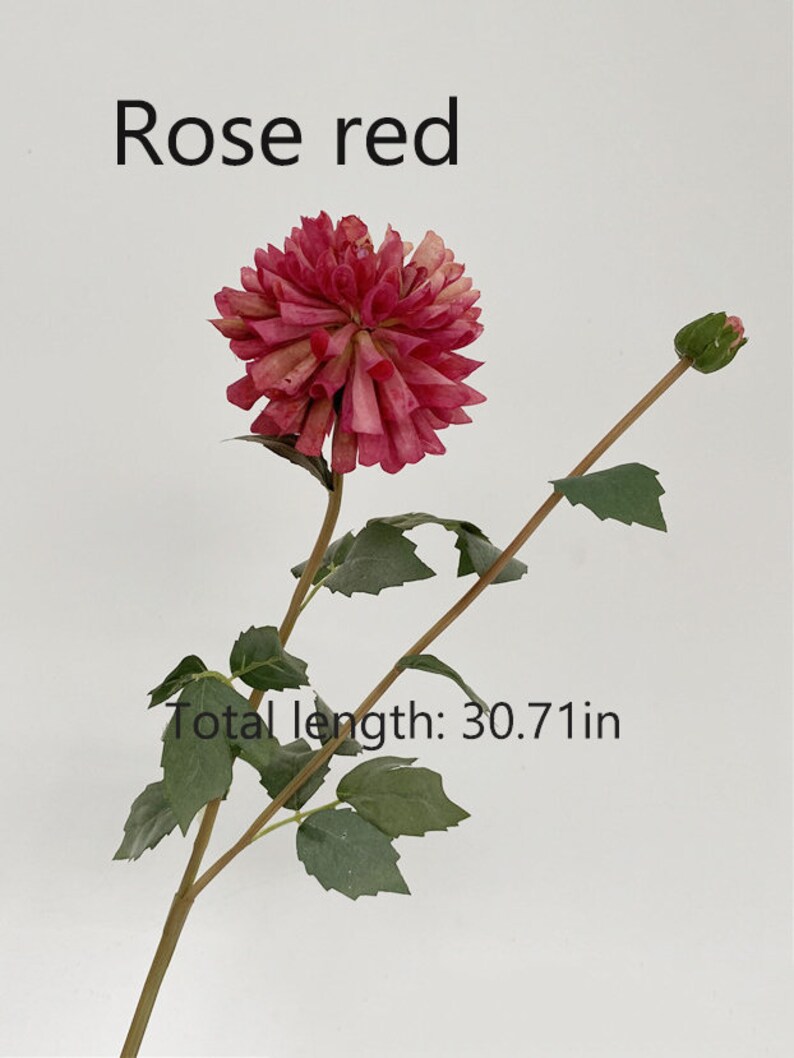 May include: A single artificial rose red dahlia flower stem with green leaves. The stem is approximately 30.71 inches long.  Rose red.