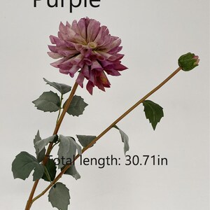 May include: A single stem of artificial purple dahlia with green leaves and a bud. The stem is approximately 30.71 inches long.  Purple.