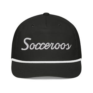 May include: Black baseball cap with a white rope trim and white embroidered text that says "Socceroo's".