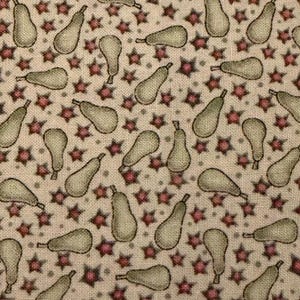 May include: Fabric with a repeating pattern of light green pears and red stars on a beige background. The pears are outlined in a darker green, and the stars have a darker red outline. The fabric has a vintage or country style.