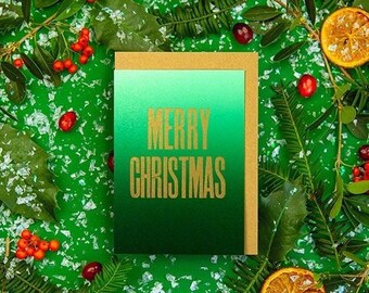 Feliz Navidad, tarjeta de felicitación hecha a mano con impresión tipográfica, degradado verde con dorado metálico