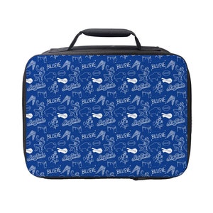 May include: A blue lunch bag with a white pattern of various images and the word "Believe" repeated throughout.