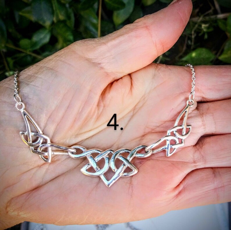 Choice of 4 different designs. Celtic Necklaces in Sterling Silver with Amethyst stones by Anita McKenzie